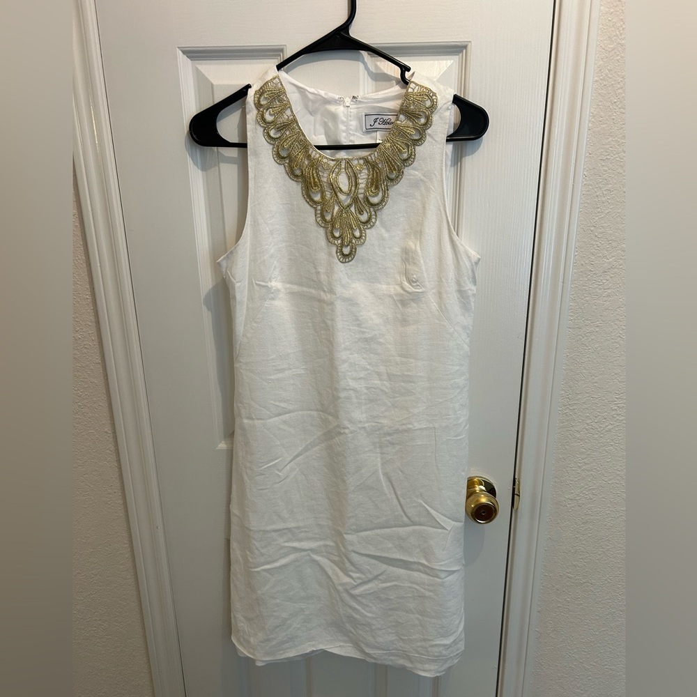 Elegant White Dress with Gold Embellishments
